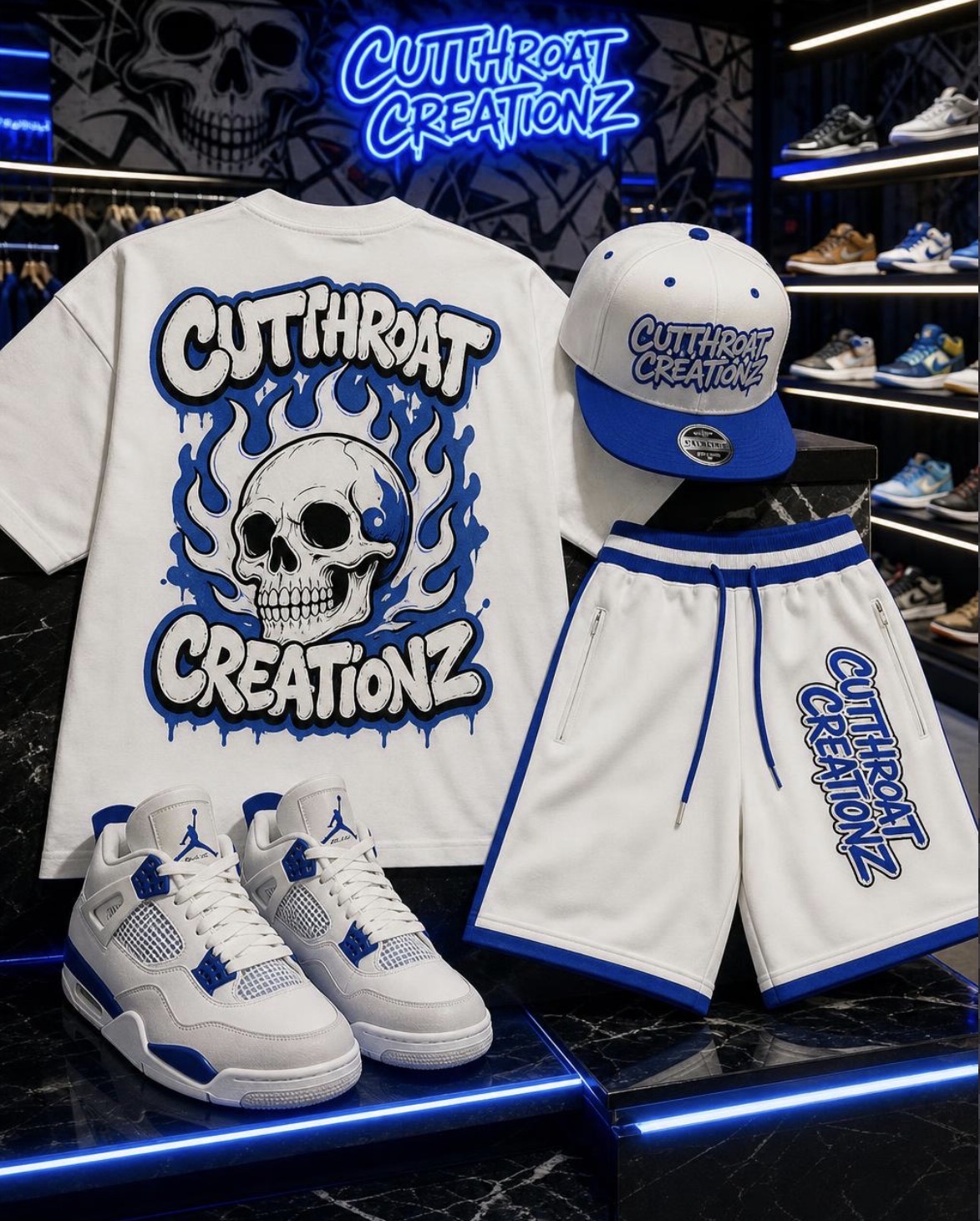 Cutthroat Creationz blue and white apparel drop — skull flame tee, snapback hat, shorts and sneakers